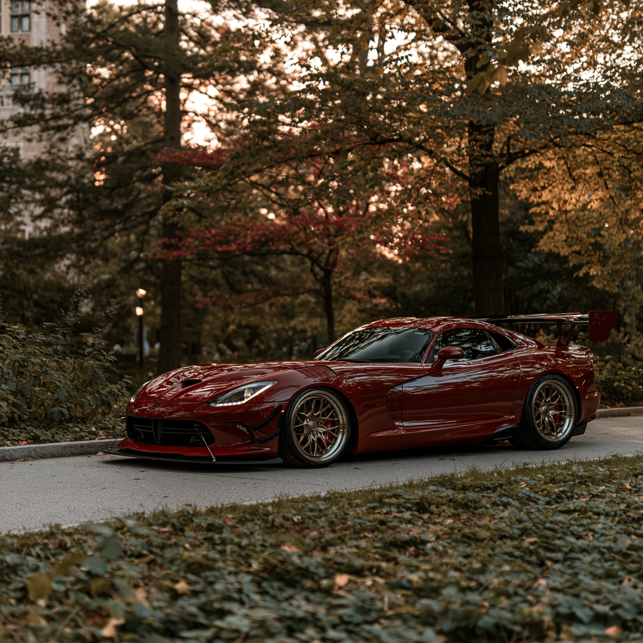 Ruby Dodge Viper Among Autumn Trees jigsaw puzzle